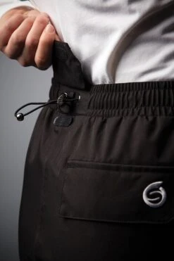 Sunderland MONTANA Ladies Lightweight Waterproof Golf Trousers BLACK Lifetime Waterproof Guarantee -Elite Golf Shop 890x1200 fitbox montanatrousers closeup waistadjuster