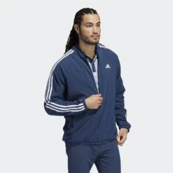 Adidas LINED FZ JKT CRENAV 8 Adidas LINED FZ JKT CRENAV -Elite Golf Shop GU5110 on model walking transparent 2000x2000 c53b10f2 6b46 4eeb be4a a6b17598af99